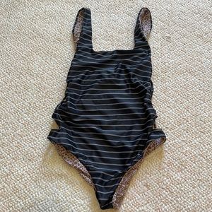 Acacia one piece in classic stripe size small.